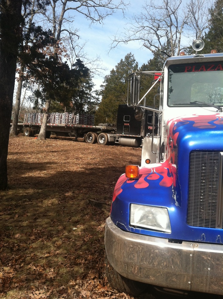 Towing semi-truck out of the woods