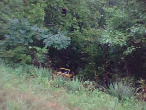 Truck gone off a hill at Pigeon Creek
